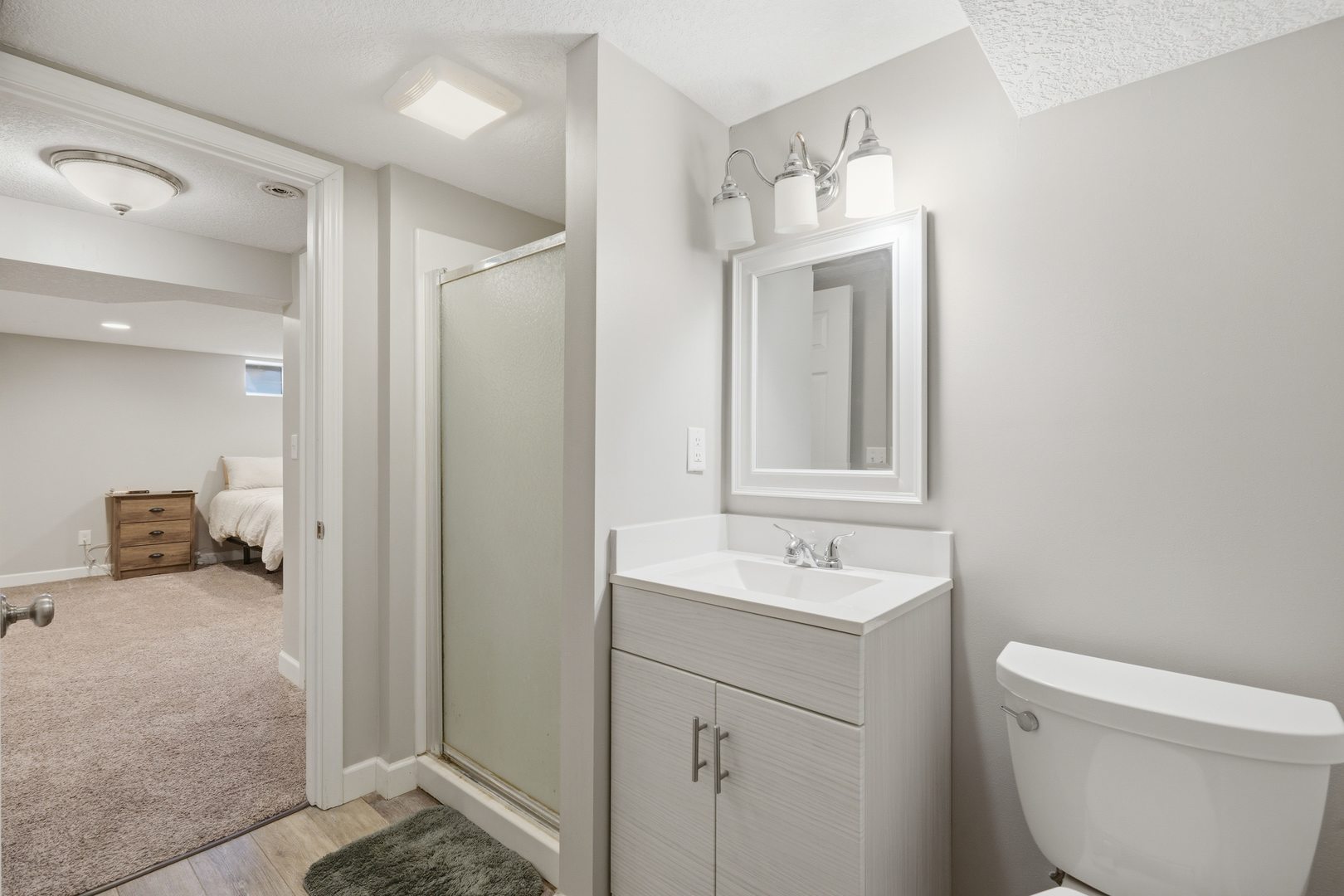 3443 3rd Street B East Moline, IL 61244 - Photo 18 of 23 a en suite bathroom with a sink and a mirror