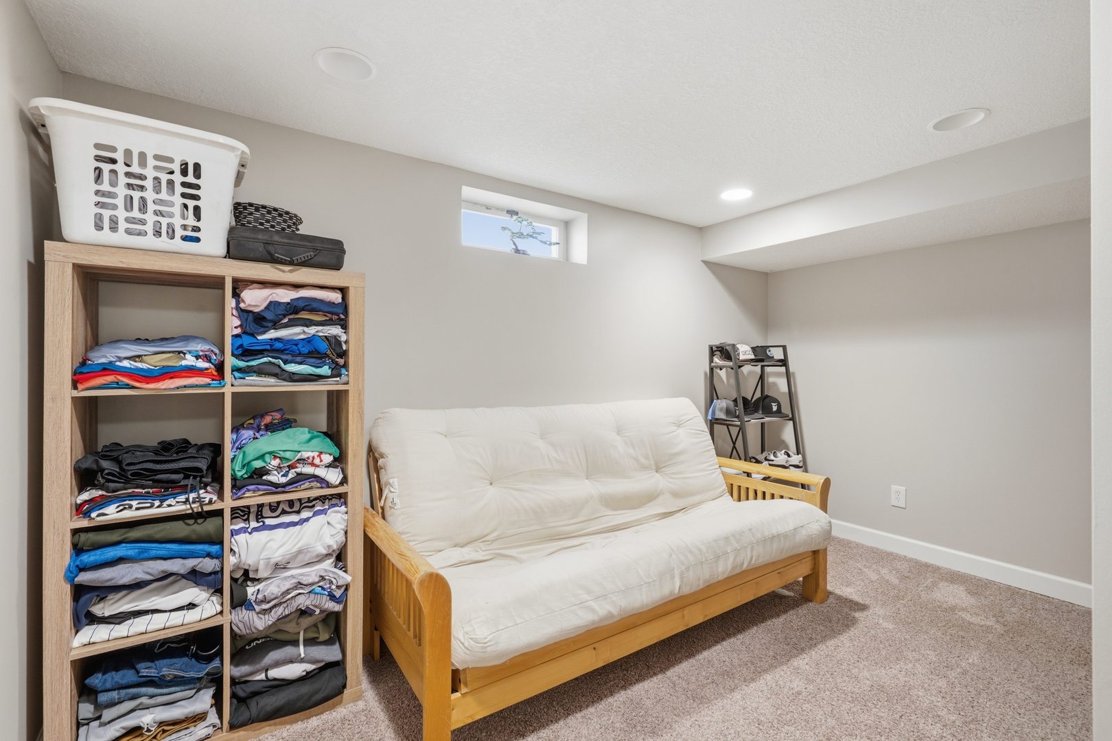 3443 3rd Street B East Moline, IL 61244 - Photo 19 of 23 a bedroom with a bed and a window