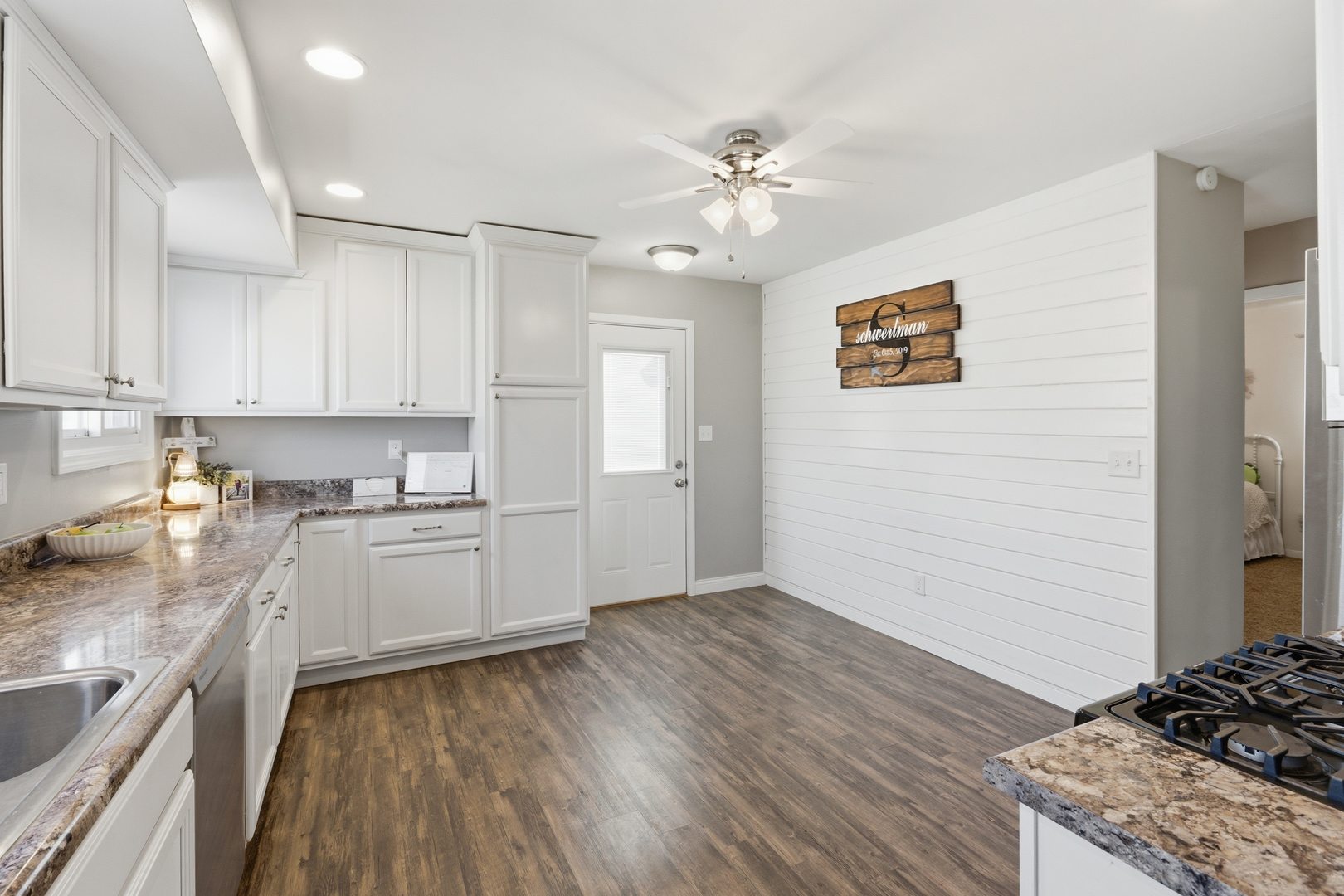3443 3rd Street B East Moline, IL 61244 - Photo 6 of 23 a kitchen with a refrigerator and a sink