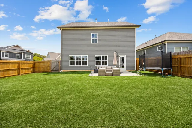 a front view of house with yard