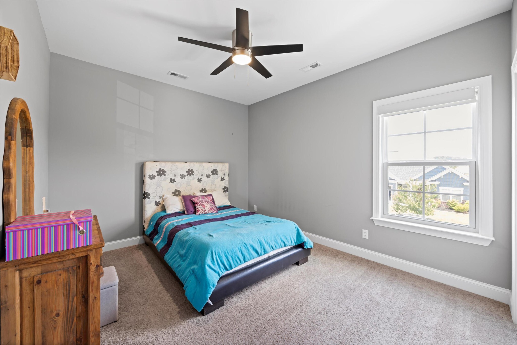 3569 Weathervane Loop Apison, TN 37302 - Photo 22 of 36 a bedroom with a bed a window and flowerpot