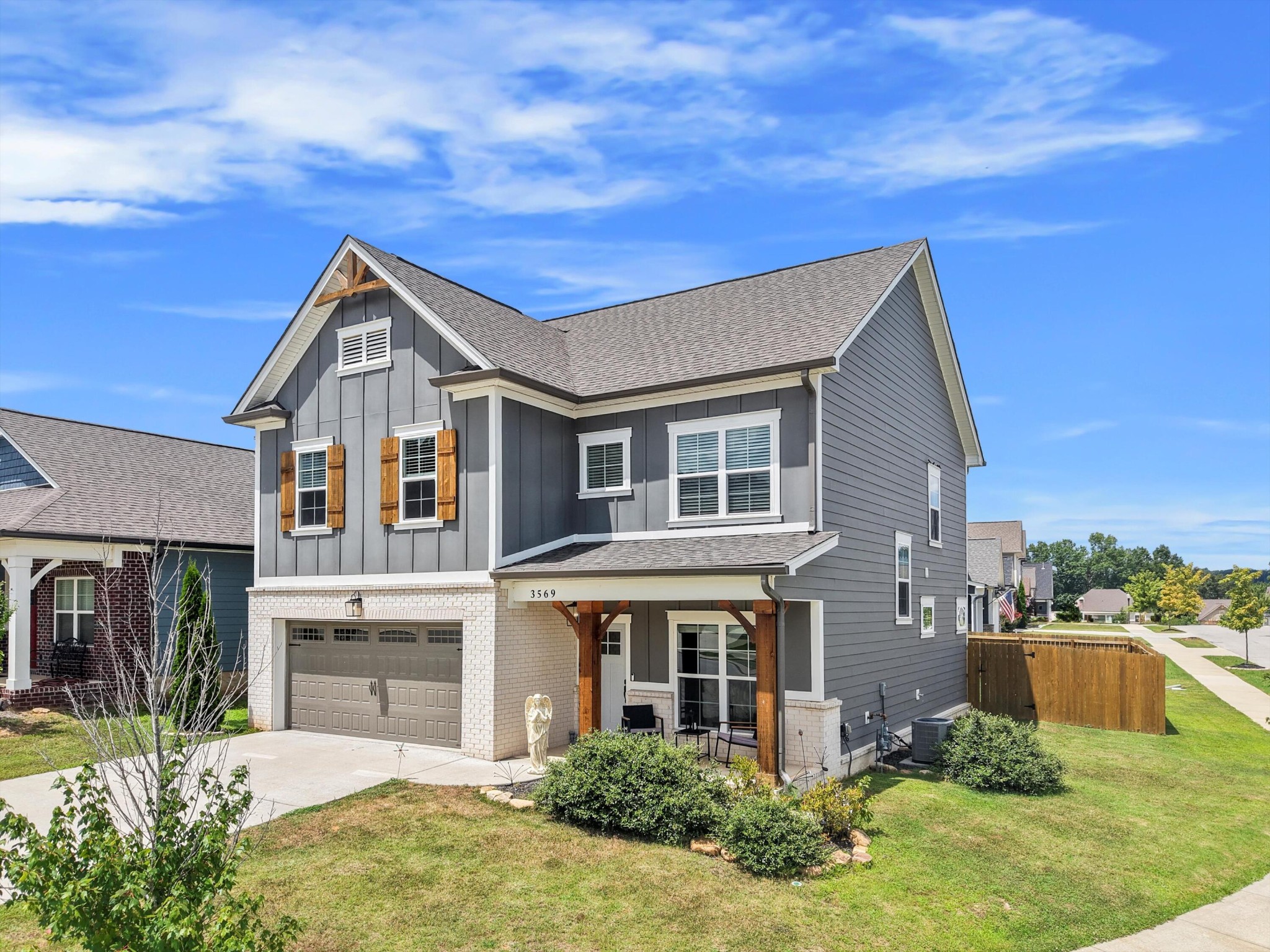 3569 Weathervane Loop Apison, TN 37302 - Photo 28 of 36 a front view of a house with garden