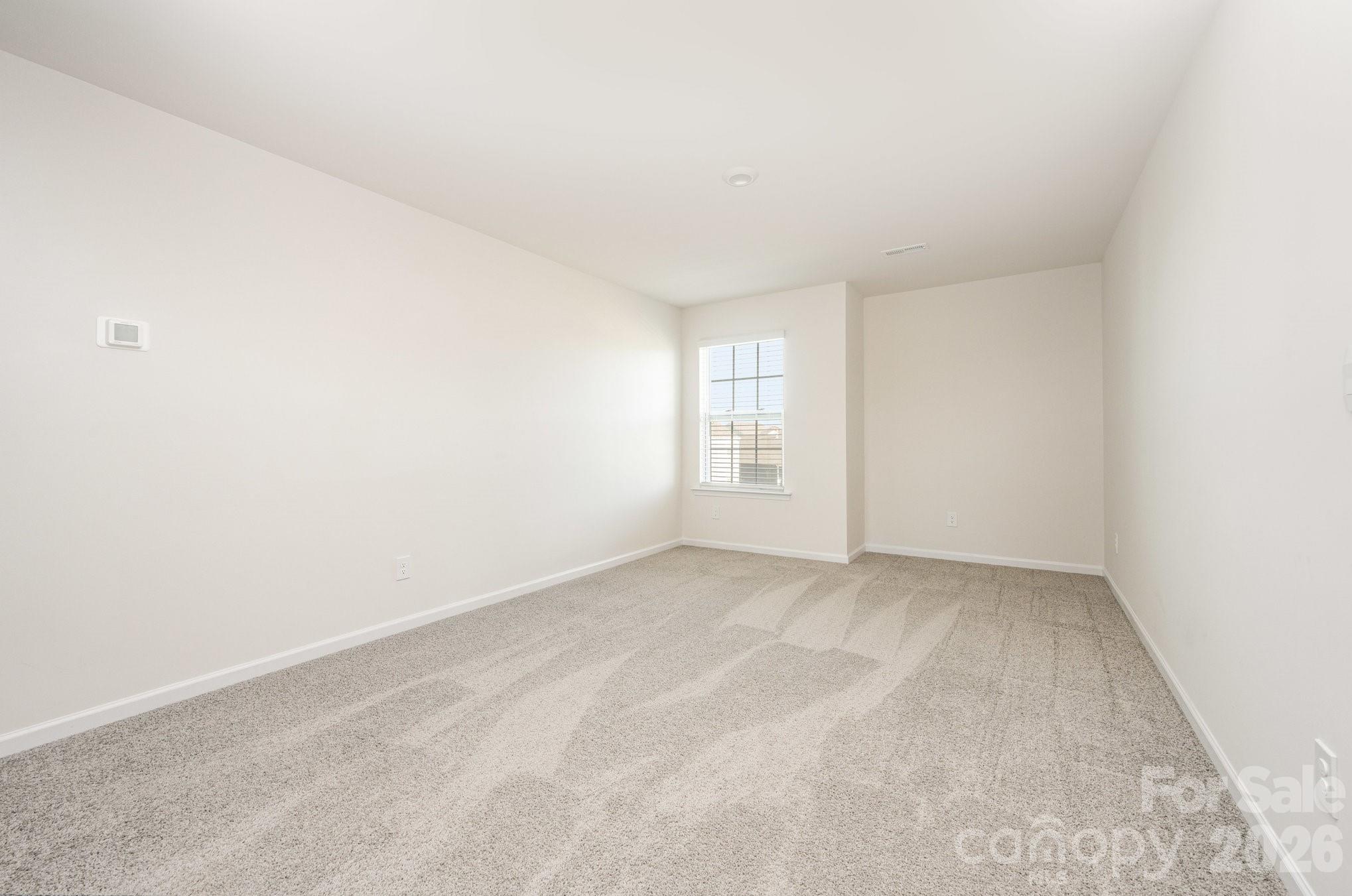 2116 Vanderlyn Street Monroe, NC 28112 - Photo 15 of 20 an empty room with windows