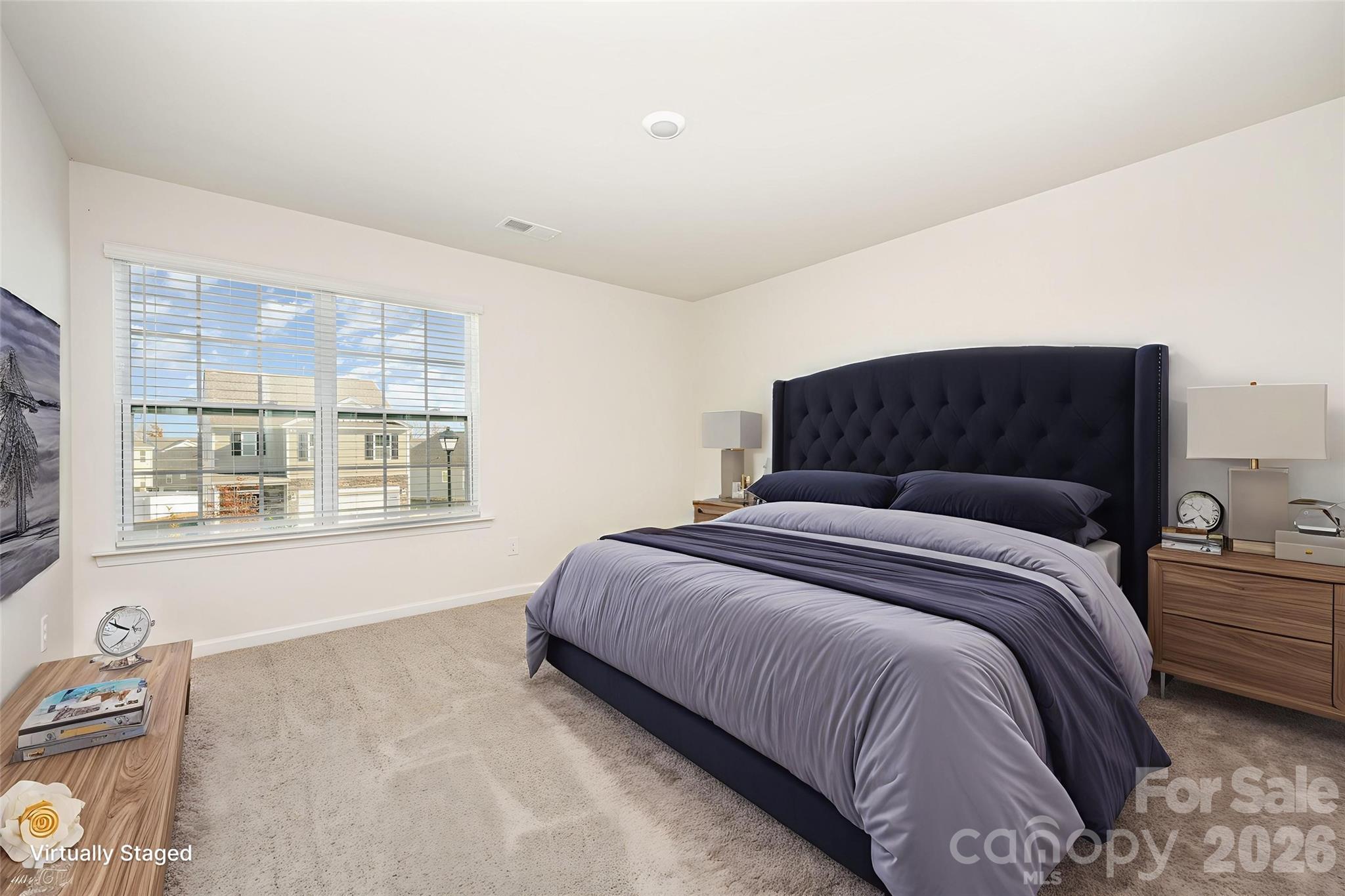 2116 Vanderlyn Street Monroe, NC 28112 - Photo 16 of 20 a bedroom with a bed and a window