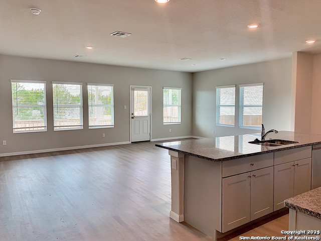 32141 Morels Avenue Bulverde, TX 78163 - Photo 4 of 22 a kitchen with sink and window