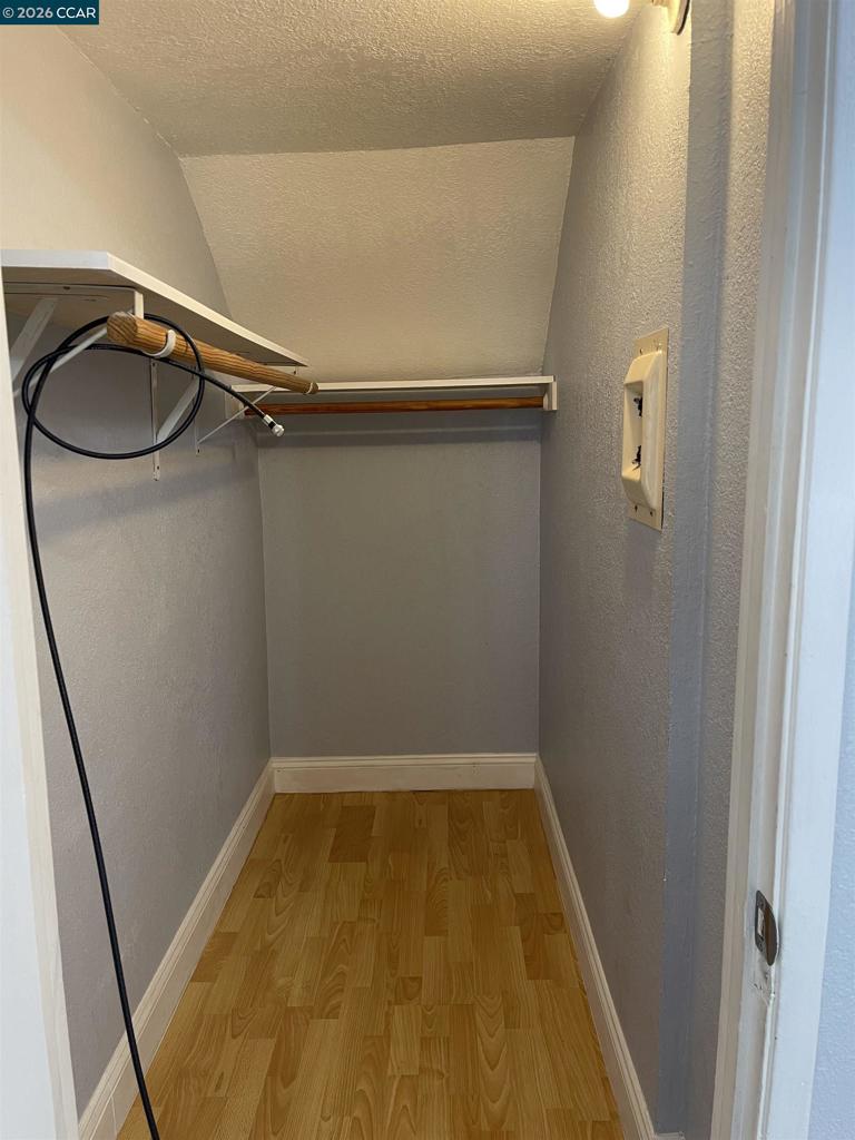 1705 Linden Street Oakland, CA 94607 - Photo 11 of 22 a bathroom with a granite countertop shower and a sink