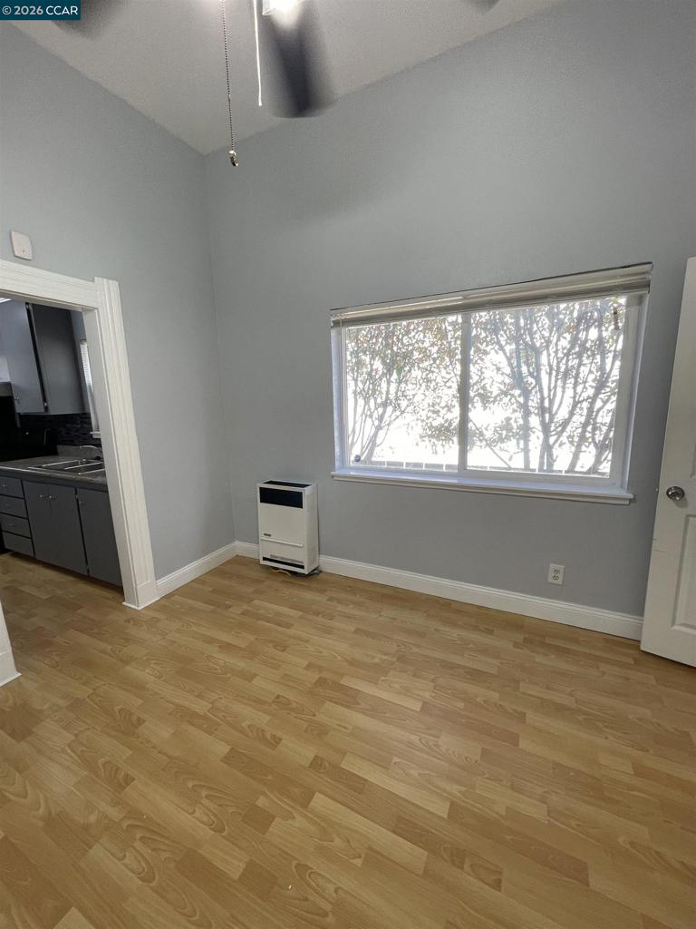 1705 Linden Street Oakland, CA 94607 - Photo 14 of 22 a view of an empty room with a window