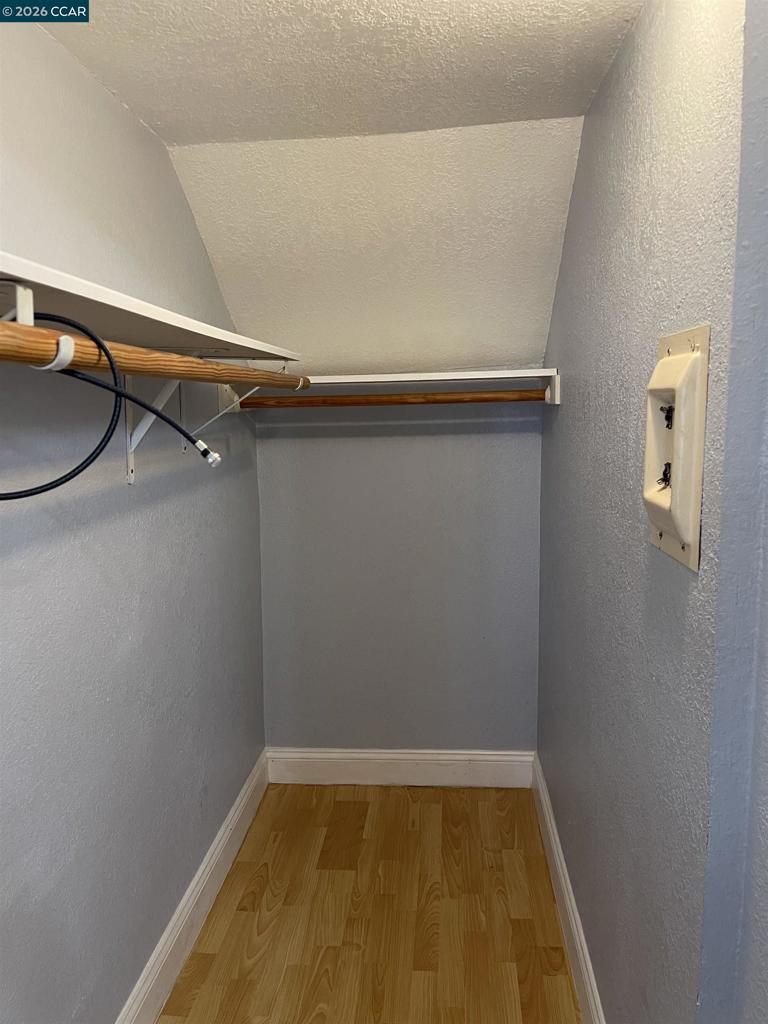 1705 Linden Street Oakland, CA 94607 - Photo 10 of 22 closeup view of a room with racks on the wall