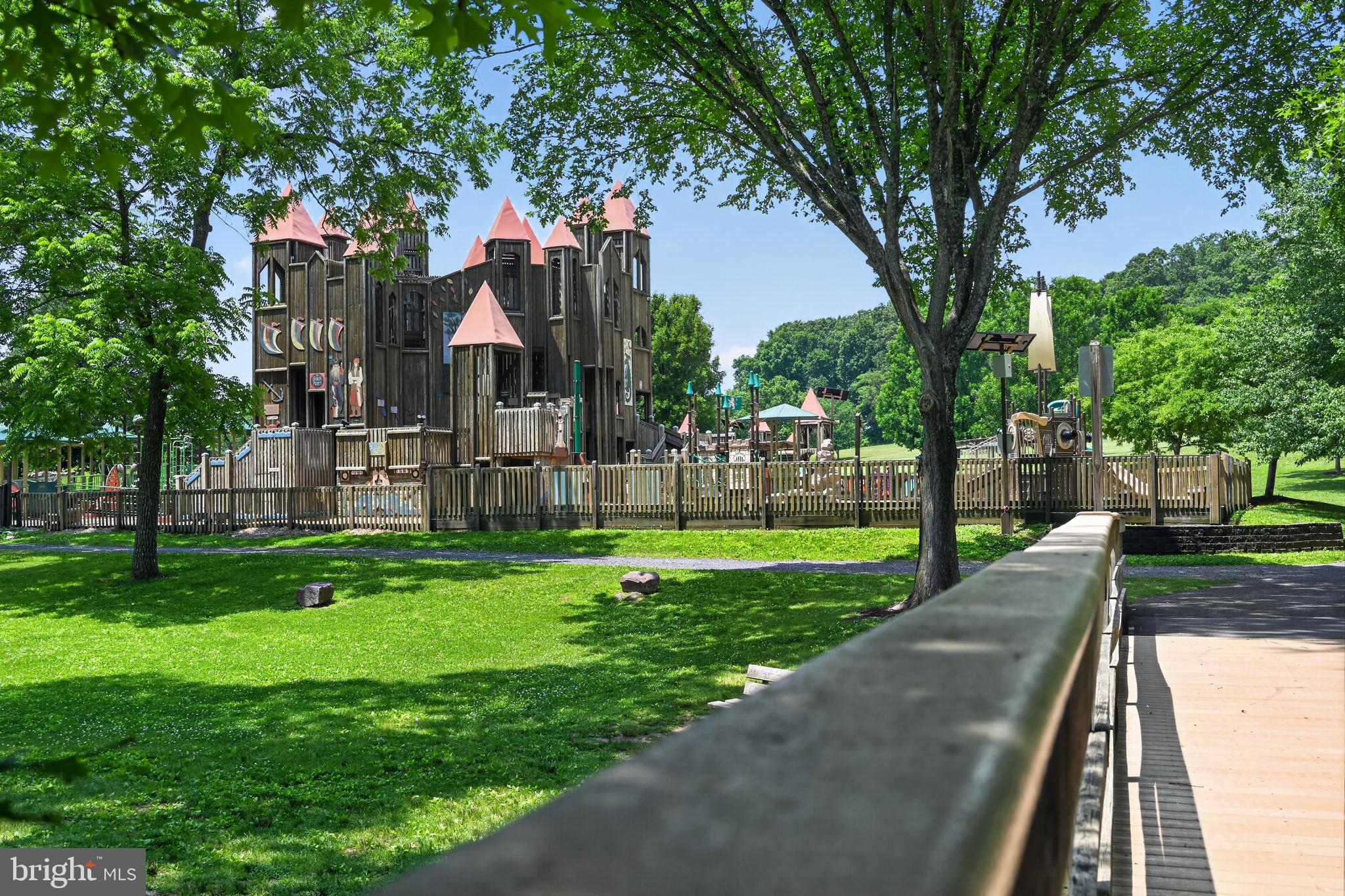 460 Wells Road Doylestown, PA 18901 - Photo 51 of 65 Whimsical playground in lush greenery.
