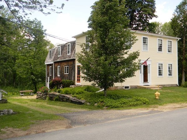 29 Wellington Road Templeton, MA 01468 - Photo 1 of 29 a view of a house with a yard and large trees