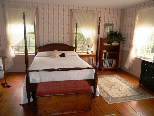 29 Wellington Road Templeton, MA 01468 - Photo 17 of 29 a bedroom with a bed and wooden floor