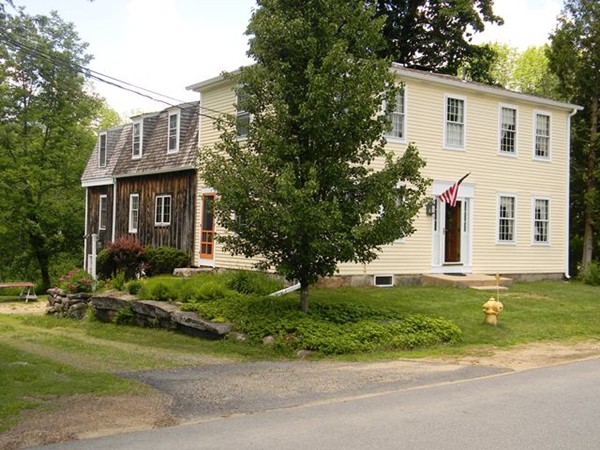29 Wellington Road Templeton, MA 01468 - Photo 29 of 29 a front view of a house with a garden