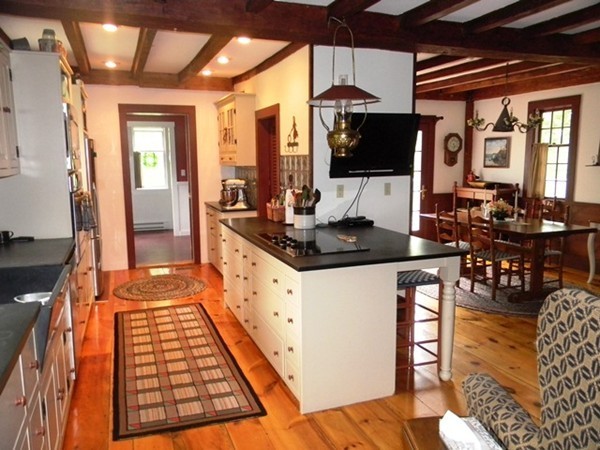 29 Wellington Road Templeton, MA 01468 - Photo 4 of 29 a kitchen with stainless steel appliances granite countertop a stove and a microwave