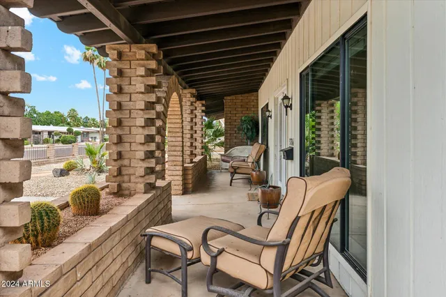 a building outdoor space with patio furniture