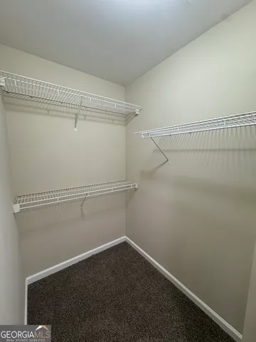 a view of a room with racks on the wall