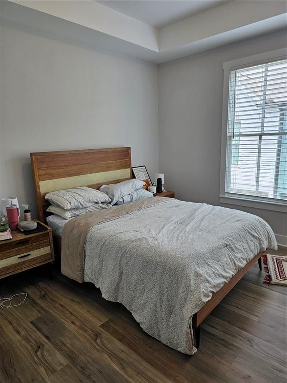 732 Perch Place Atlanta, GA 30312 - Photo 17 of 25 a bedroom with a bed and a window
