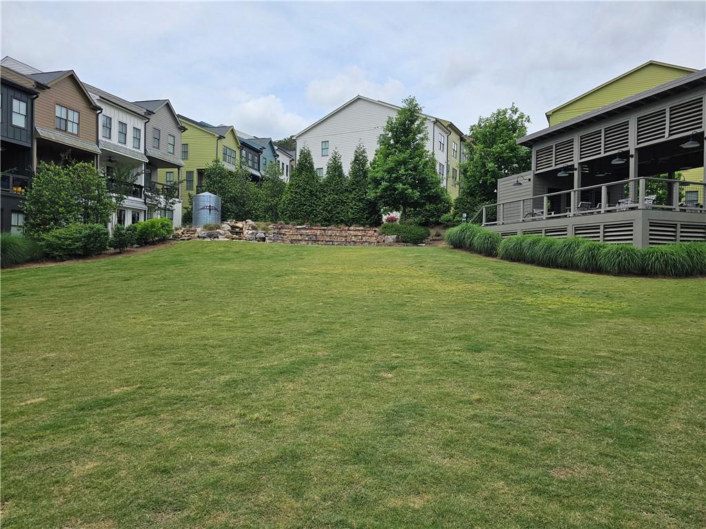 732 Perch Place Atlanta, GA 30312 - Photo 23 of 25 a view of a building next to a big yard