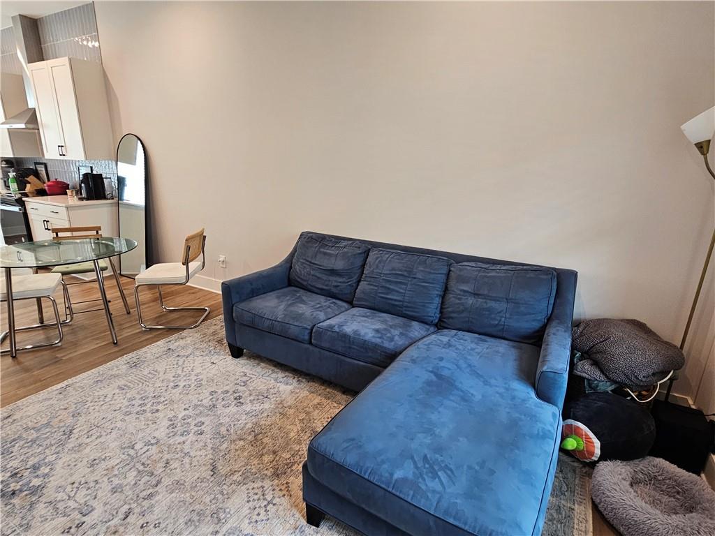 732 Perch Place Atlanta, GA 30312 - Photo 5 of 25 a living room with furniture and a couch