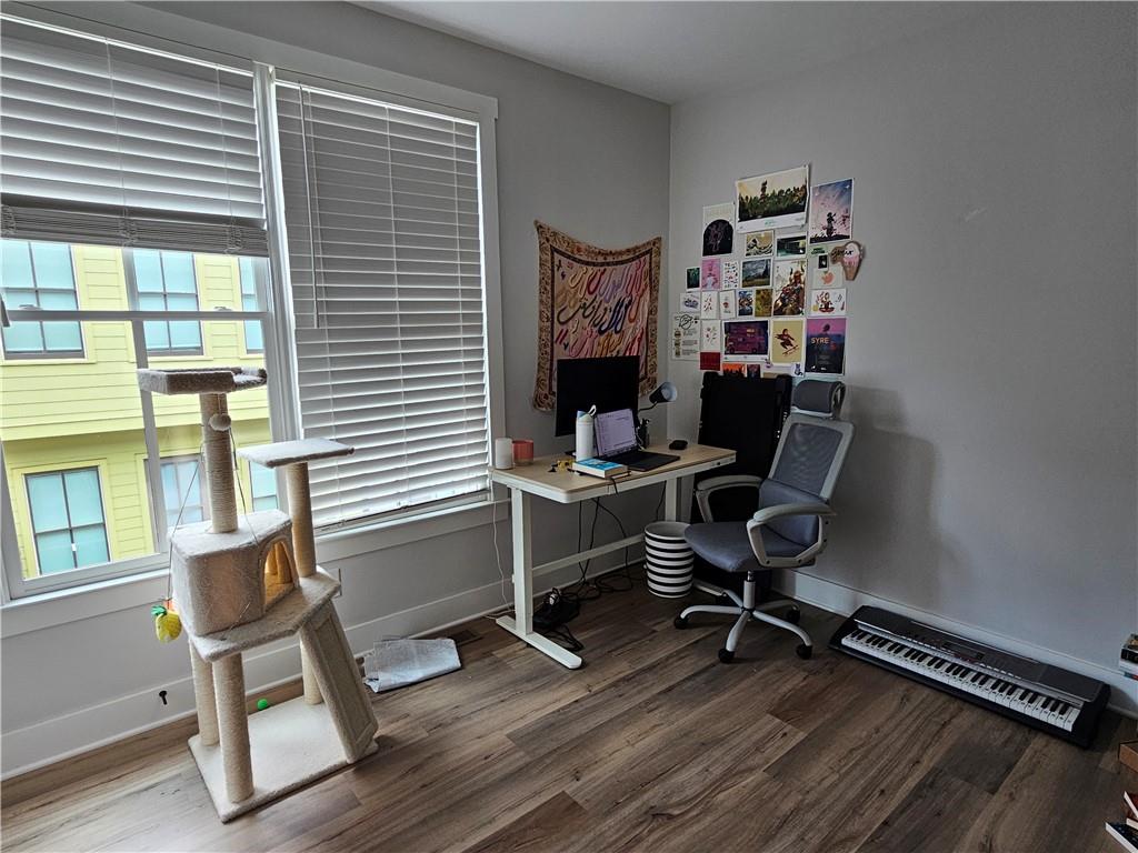 732 Perch Place Atlanta, GA 30312 - Photo 7 of 25 a view of a workspace with furniture and a window