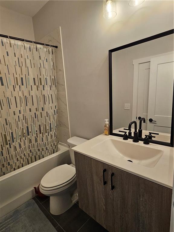 732 Perch Place Atlanta, GA 30312 - Photo 9 of 25 a bathroom with a sink a toilet and shower
