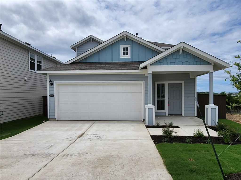 a front view of a house with yard