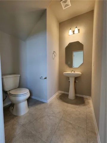 a bathroom with a toilet