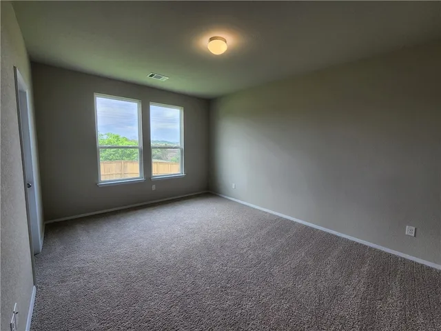 a bathroom with a double vanity sink mirror and double