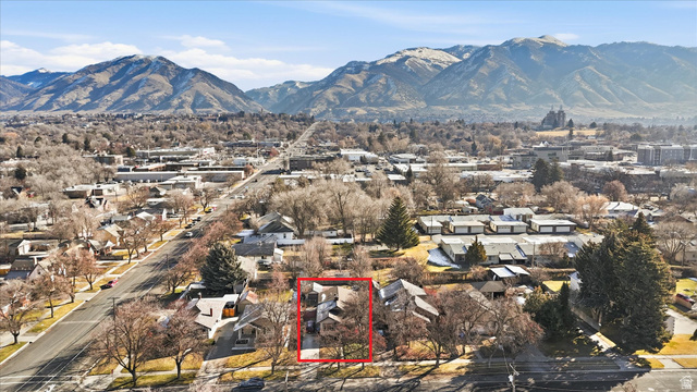 380 North 200 West Logan, UT 84321 - Photo 24 of 29 Aerial view of residential area featuring property boundaries highlighted and mountains