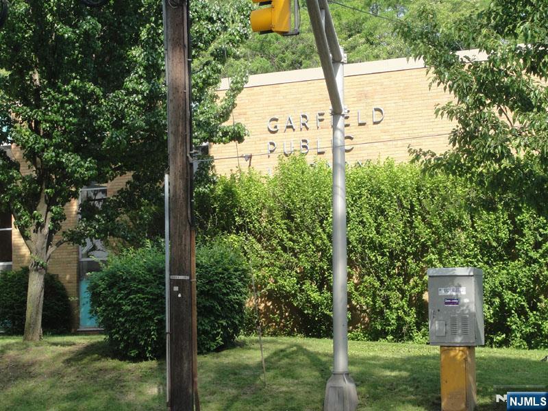 47 Harding Court, Unit 2 Garfield, NJ 07026 - Photo 30 of 34 a view of a back yard