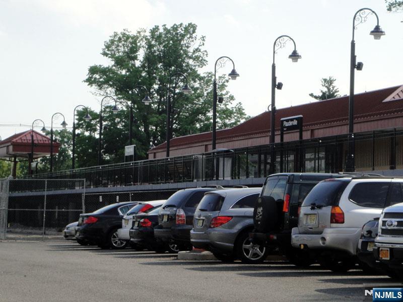 47 Harding Court, Unit 2 Garfield, NJ 07026 - Photo 33 of 34 a front view of a house with car parked