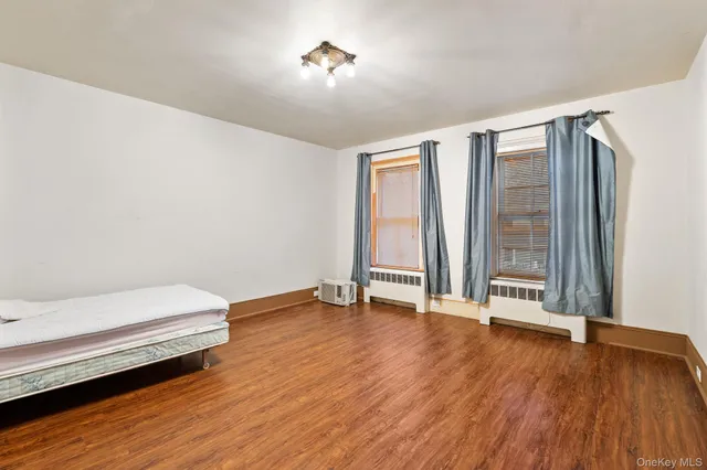 a view of a bathroom from a corridor