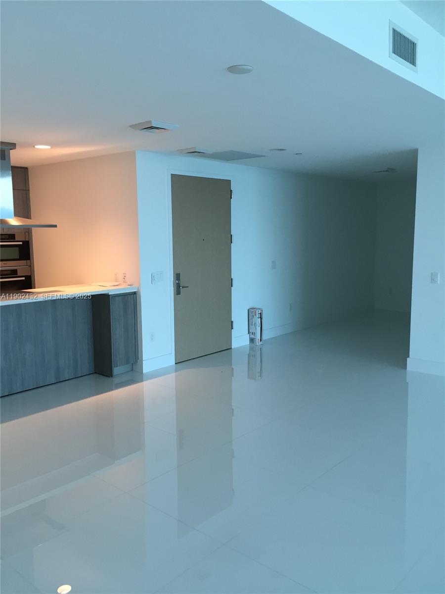 350 Ocean Drive, Unit 704N Key Biscayne, FL 33149 - Photo 17 of 34 a view of a kitchen with a sink