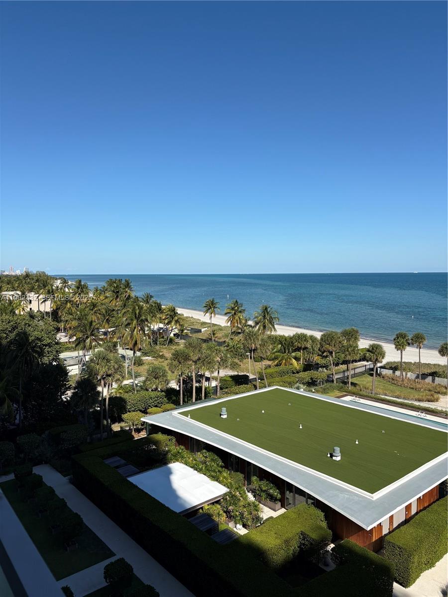 350 Ocean Drive, Unit 704N Key Biscayne, FL 33149 - Photo 27 of 34 a view of a swimming pool with an ocean view