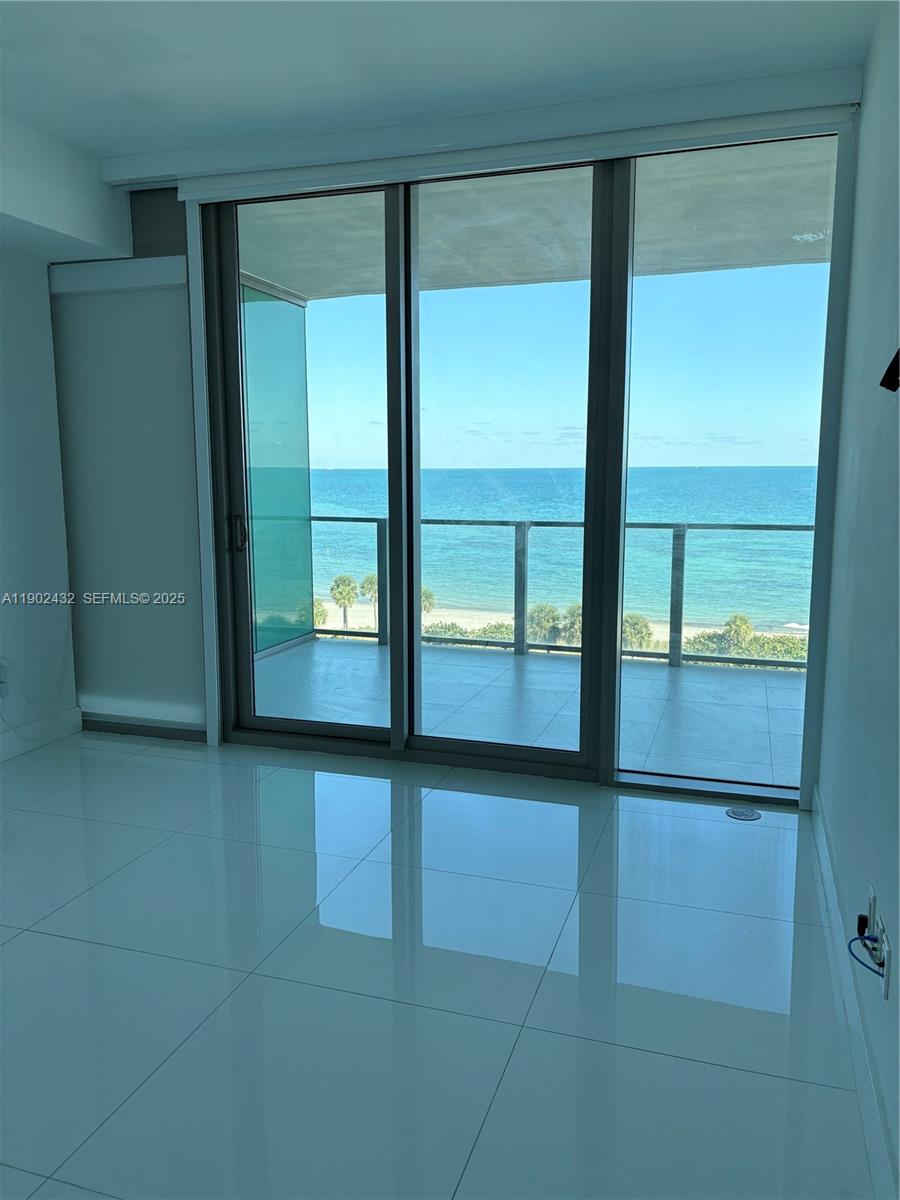 350 Ocean Drive, Unit 704N Key Biscayne, FL 33149 - Photo 6 of 34 view of an empty room with a window