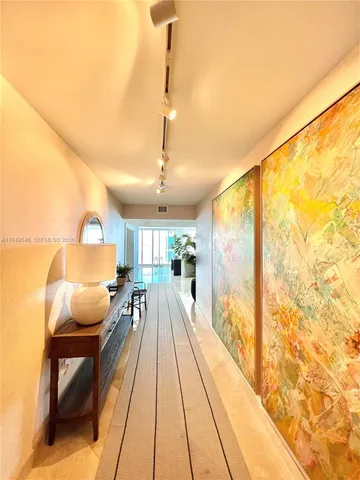 a view of a balcony with furniture