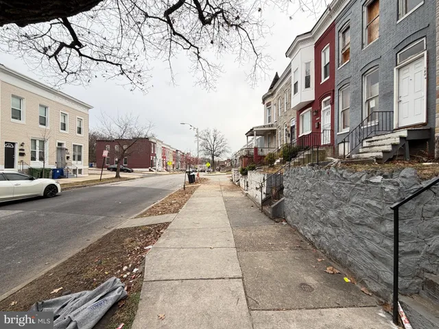 a view of a street with cars