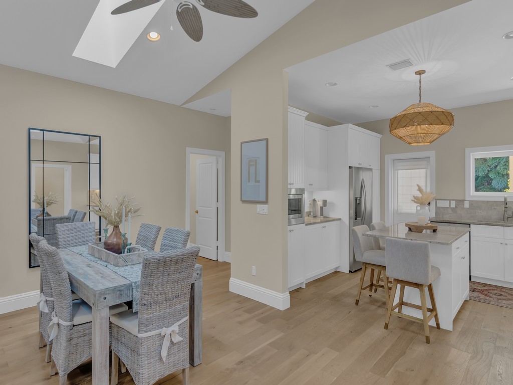 548 Conn Way Vero Beach, FL 32963 - Photo 12 of 35 a view of a dining room with furniture and a chandelier