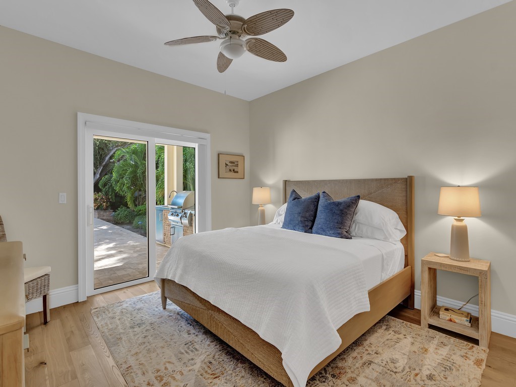 548 Conn Way Vero Beach, FL 32963 - Photo 14 of 35 a bed room with a bed and a window