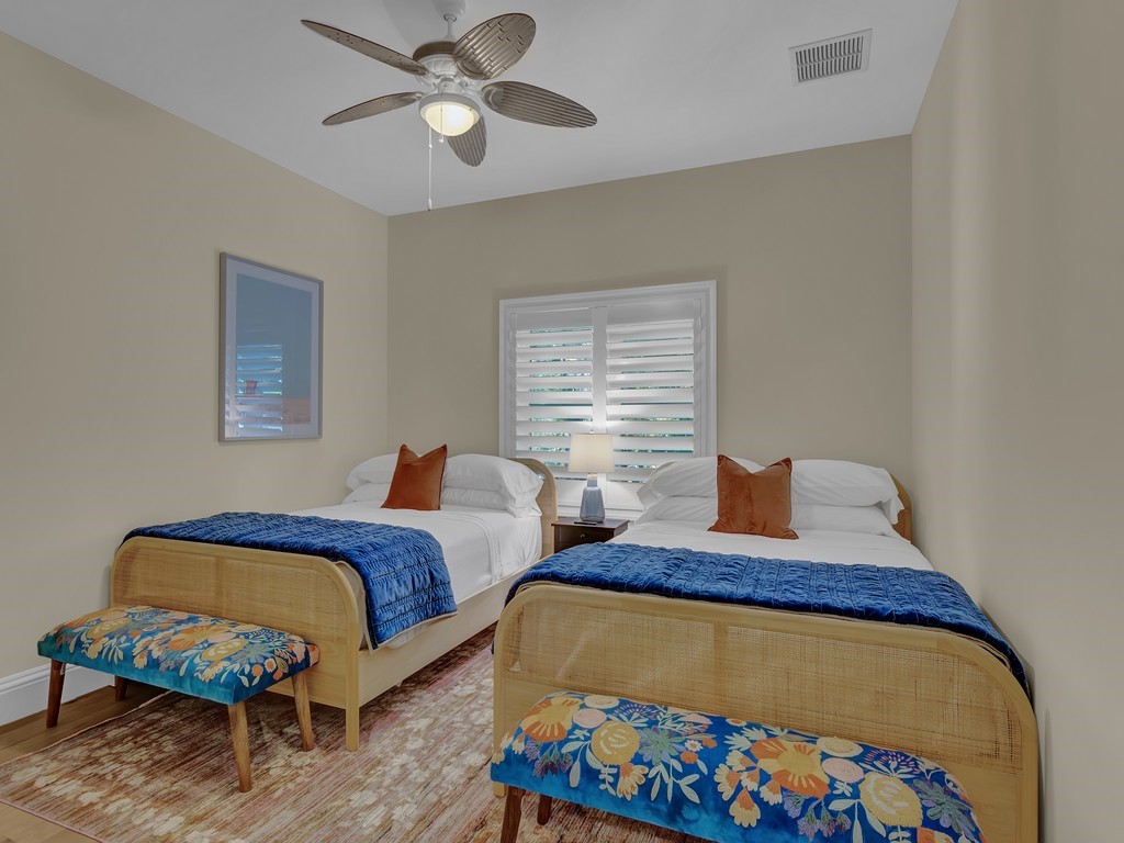 548 Conn Way Vero Beach, FL 32963 - Photo 20 of 35 a bedroom with 2 bed and a dresser