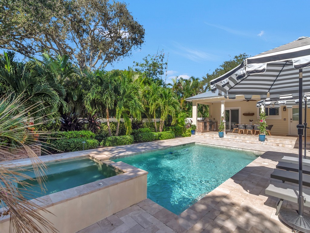 548 Conn Way Vero Beach, FL 32963 - Photo 26 of 35 a front view of a house with garden