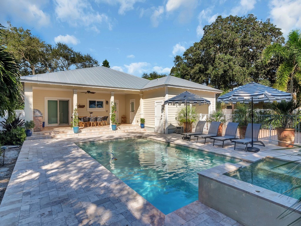 548 Conn Way Vero Beach, FL 32963 - Photo 31 of 35 swimming pool view with a seating space
