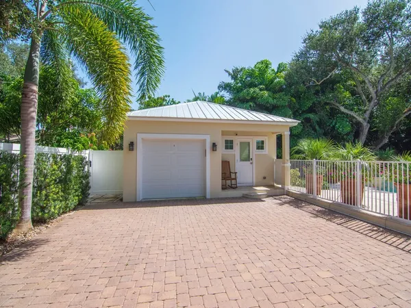 a front view of a house with a porch