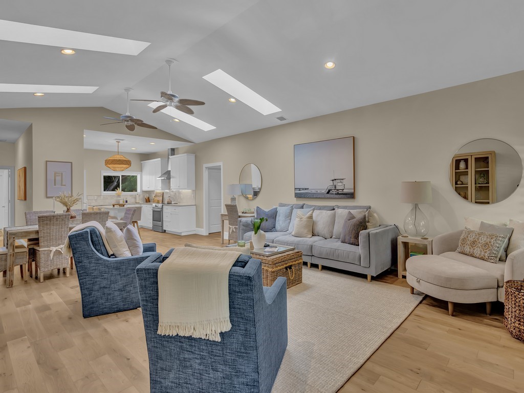 548 Conn Way Vero Beach, FL 32963 - Photo 4 of 35 a living room with furniture and a large mirror