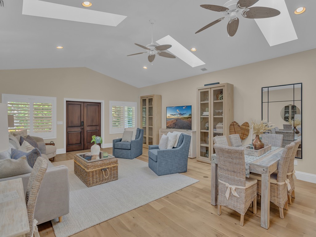 548 Conn Way Vero Beach, FL 32963 - Photo 7 of 35 a living room with furniture and a large window