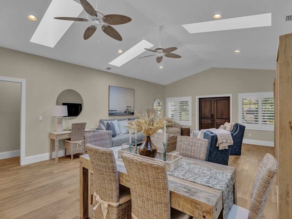 548 Conn Way Vero Beach, FL 32963 - Photo 10 of 35 a living room with fireplace furniture and a wooden floor