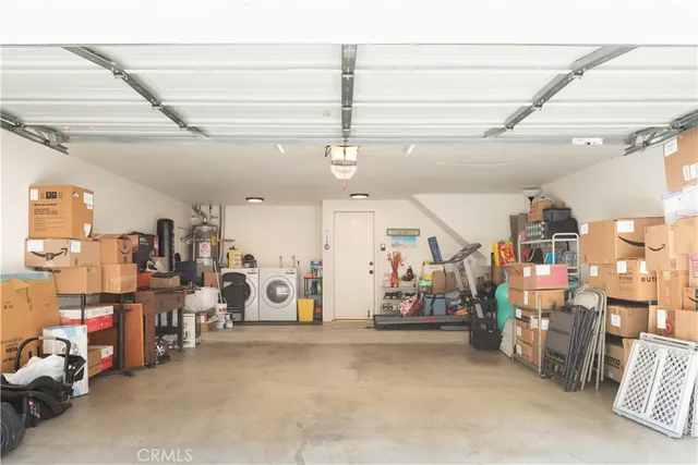a view of a white building with many windows