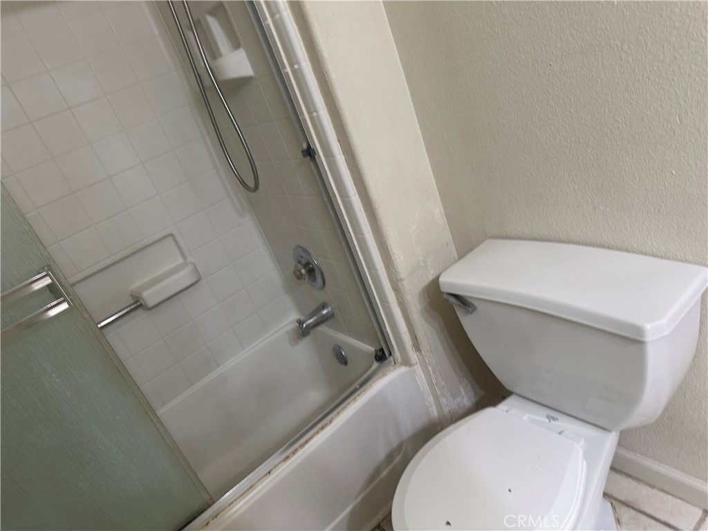 692 Gateway Circle Merced, CA 95340 - Photo 12 of 24 a white toilet sitting next to a sink