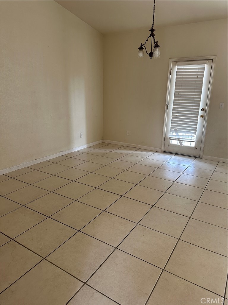 692 Gateway Circle Merced, CA 95340 - Photo 6 of 24 a view of an empty room and a window
