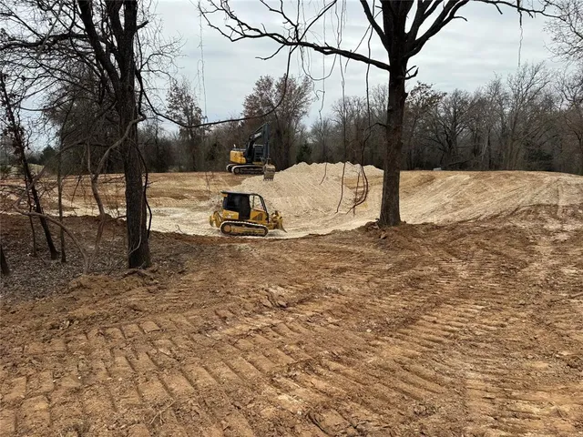 a view of a covered with snow in the yard