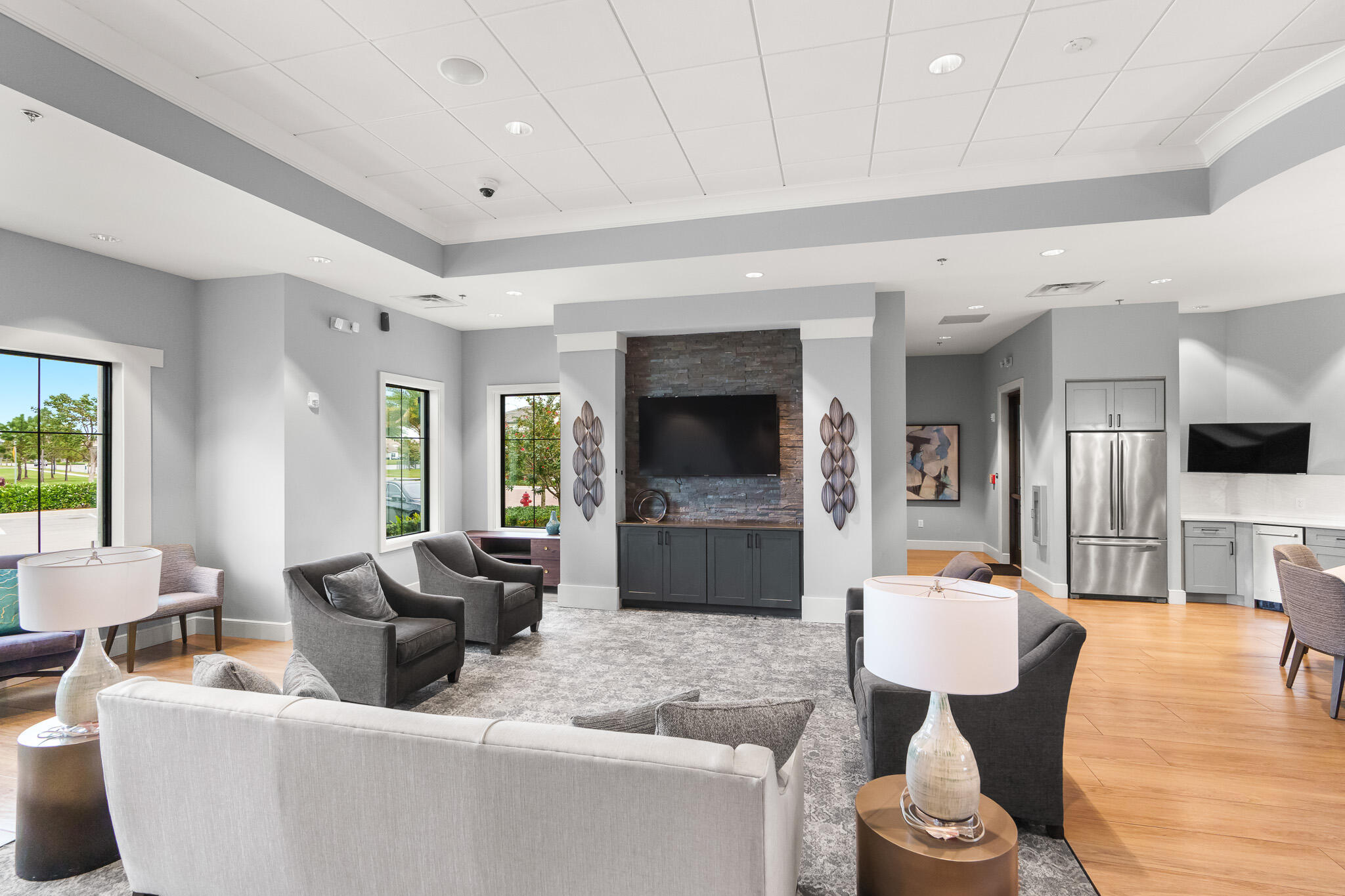 8202 Cadre Noir Road Lake Worth, FL 33467 - Photo 36 of 58 a living room with furniture and a flat screen tv